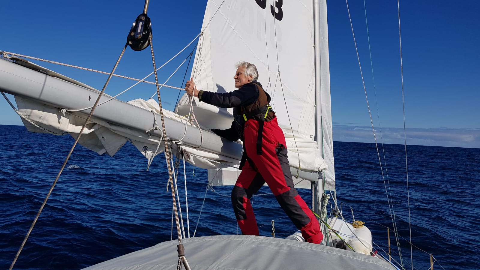 Putting in the third and final reef sail before the storm – Waiheke ...